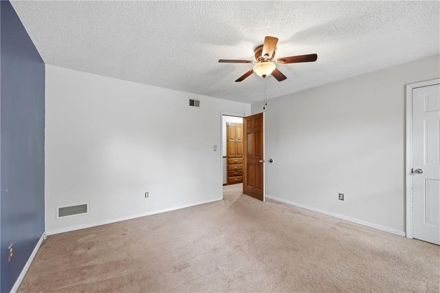 1402 NW Weatherstone Lane, Blue Springs, MO 64015