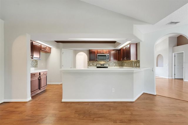 8620 SPYGLASS LOOP, Clermont, FL 34711