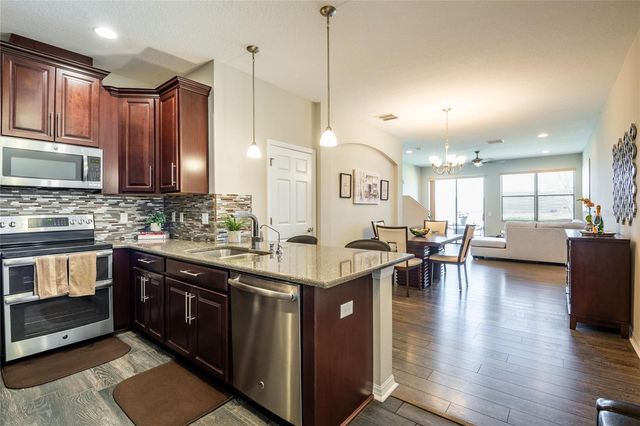 11648 CROWNED SPARROW LANE, Tampa, FL 33626