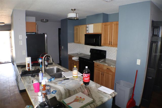 2002 PEACEFUL PALM STREET, Ruskin, FL 33570