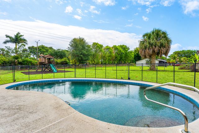 206 Parkwood Drive S, Royal Palm Beach, FL 33411