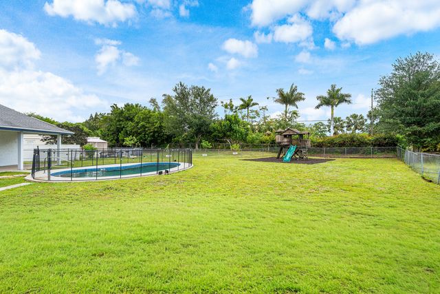 206 Parkwood Drive S, Royal Palm Beach, FL 33411