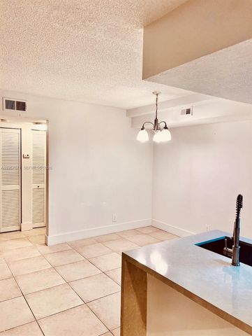 5654 Rock Island Road 214, Tamarac, FL 33319