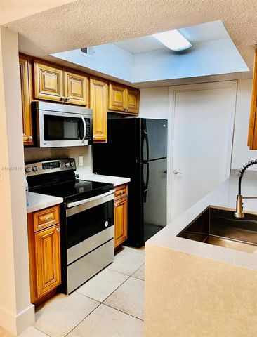 5654 Rock Island Road 214, Tamarac, FL 33319