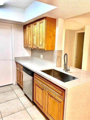 5654 Rock Island Road 214, Tamarac, FL 33319