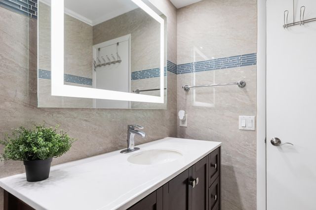 427 Golden Isles Drive, Hallandale Beach, FL 33009
