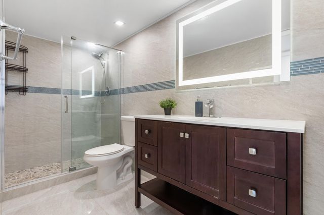 427 Golden Isles Drive, Hallandale Beach, FL 33009