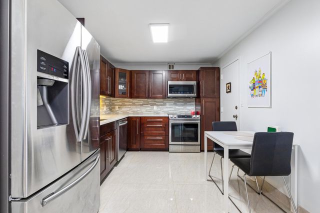 427 Golden Isles Drive, Hallandale Beach, FL 33009