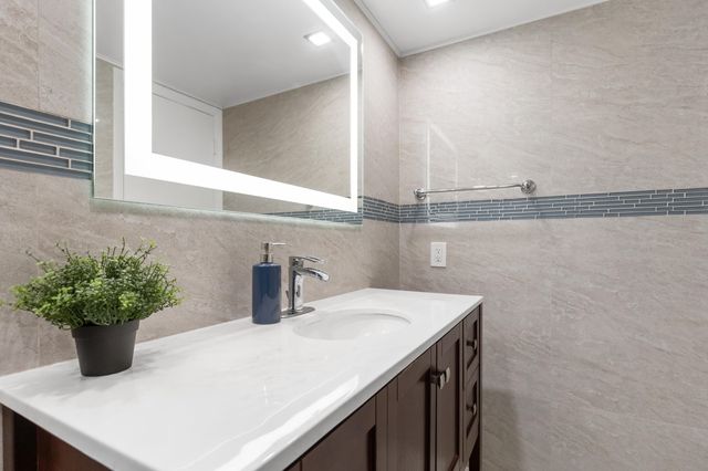 427 Golden Isles Drive, Hallandale Beach, FL 33009