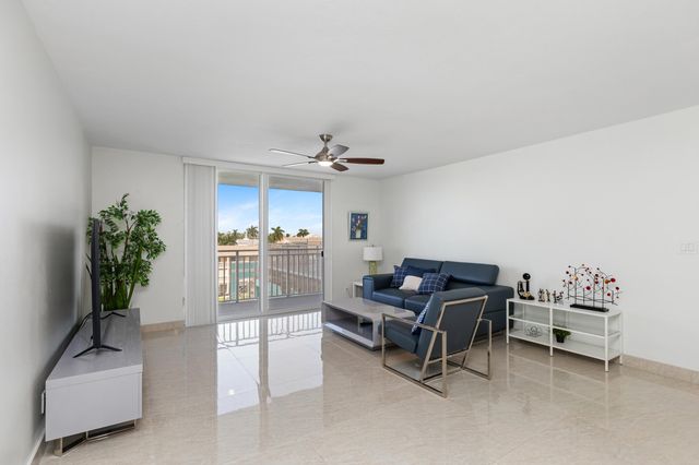 427 Golden Isles Drive, Hallandale Beach, FL 33009