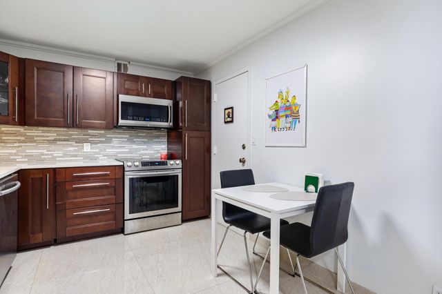 427 Golden Isles Drive, Hallandale Beach, FL 33009