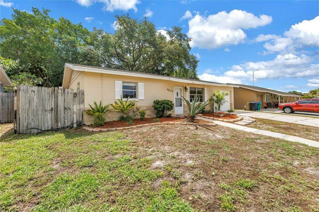 9579 GOLDEN GROVE STREET, Seminole, FL 33772