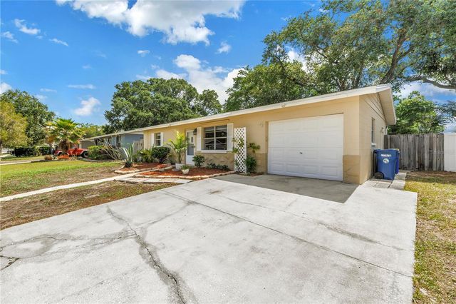 9579 GOLDEN GROVE STREET, Seminole, FL 33772