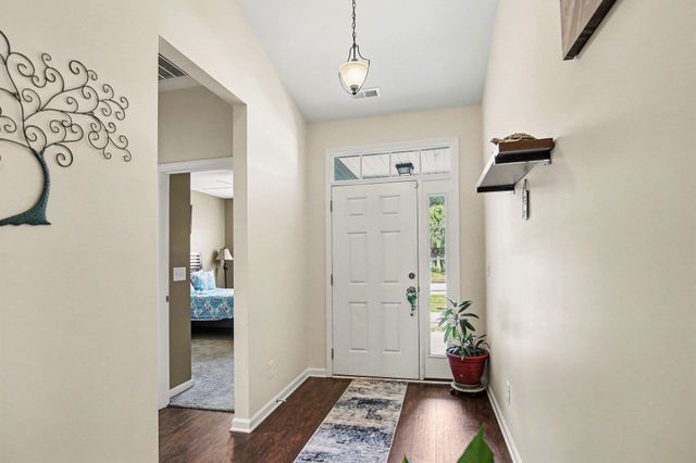 605 Queen Palm Ct., Little River, SC 29566