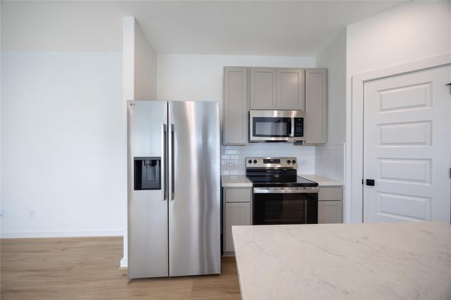 1989 Longmire Villas Court, Conroe, TX 77304