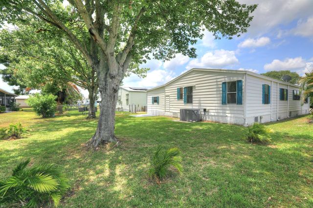 714 Amaryllis Drive, Barefoot Bay, FL 32976