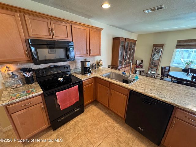 3042 Aldoro Avenue, Spring Hill, FL 34609