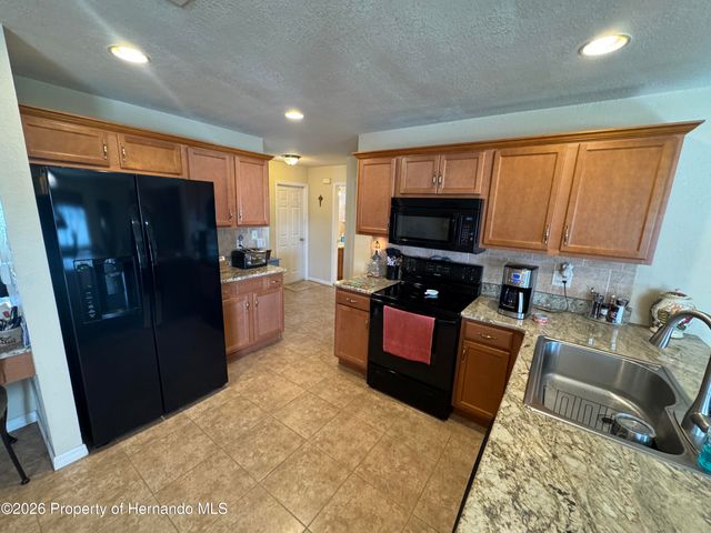 3042 Aldoro Avenue, Spring Hill, FL 34609