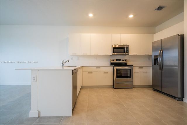 12811 NW 23rd Place, Miami, FL 33167
