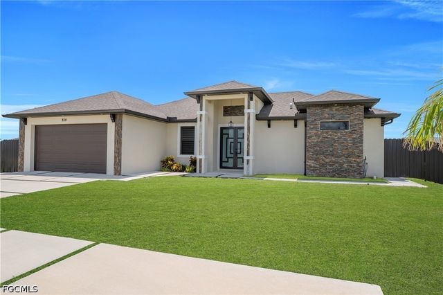 1128 Nelson RD N, Cape Coral, FL 33993