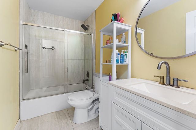 1595 Woodbridge Lakes Circle, West Palm Beach, FL 33406