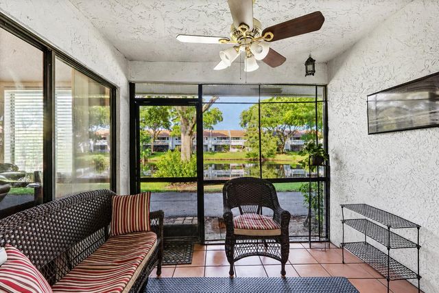 1595 Woodbridge Lakes Circle, West Palm Beach, FL 33406