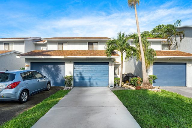 1595 Woodbridge Lakes Circle, West Palm Beach, FL 33406