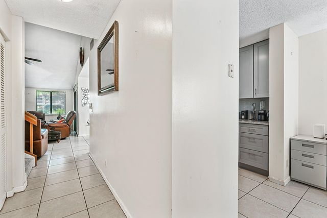 1595 Woodbridge Lakes Circle, West Palm Beach, FL 33406