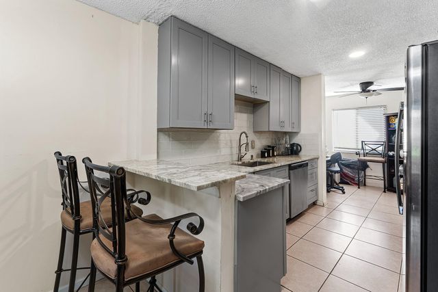 1595 Woodbridge Lakes Circle, West Palm Beach, FL 33406