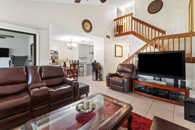 1595 Woodbridge Lakes Circle, West Palm Beach, FL 33406