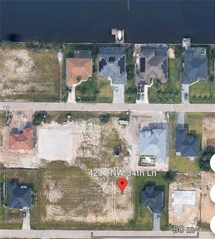 Image 2 of property listing at 4237 NW 34th LN, Cape Coral, FL 33993