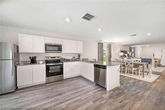 2080 GOLDEN BEAK Drive, Eagle Lake, FL 33839