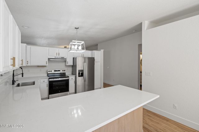 7090 Strauss Drive, Sun Valley, NV 89433
