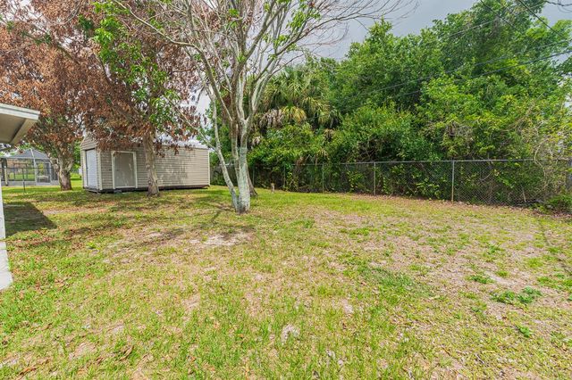 1469 SW Leisure Lane, Port St. Lucie, FL 34953