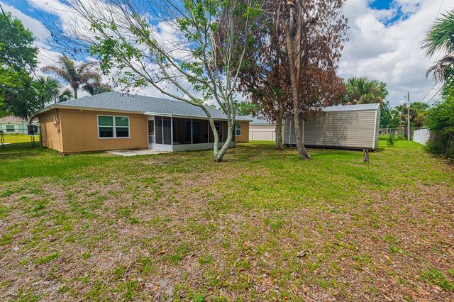 1469 SW Leisure Lane, Port St. Lucie, FL 34953