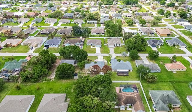 1469 SW Leisure Lane, Port St. Lucie, FL 34953