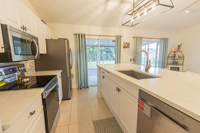 1469 SW Leisure Lane, Port St. Lucie, FL 34953