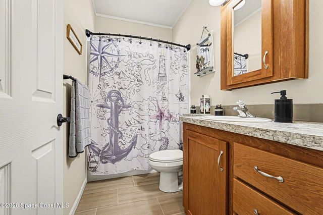 1067 Wren Circle, Barefoot Bay, FL 32976