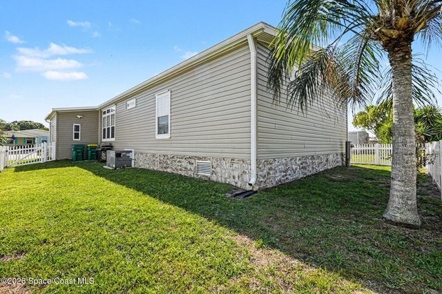 1067 Wren Circle, Barefoot Bay, FL 32976