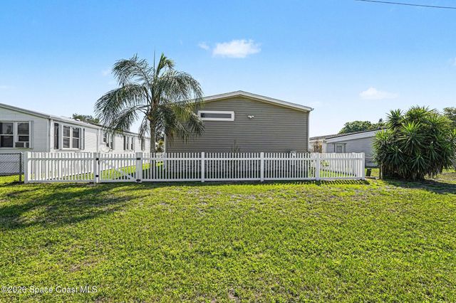 1067 Wren Circle, Barefoot Bay, FL 32976