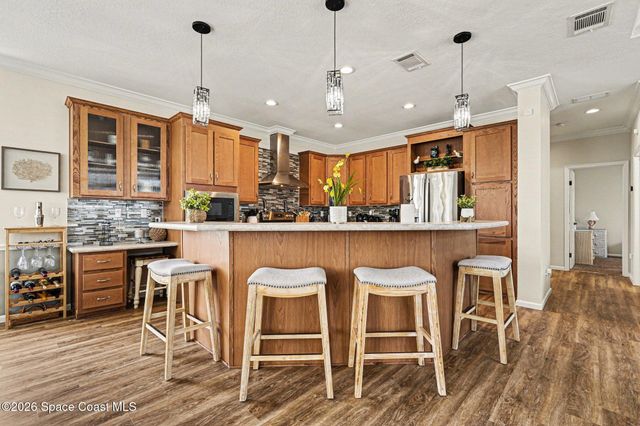 1067 Wren Circle, Barefoot Bay, FL 32976