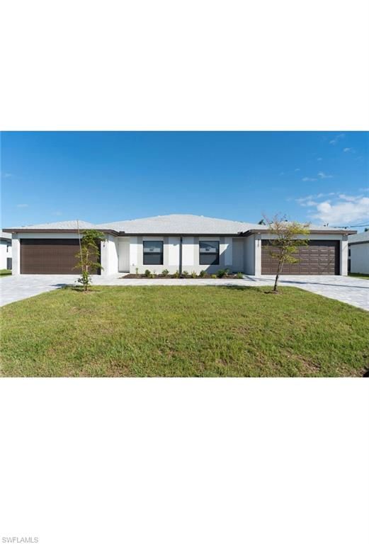 317-319 SW 47th TER, CAPE CORAL, FL 33914 — photo 2