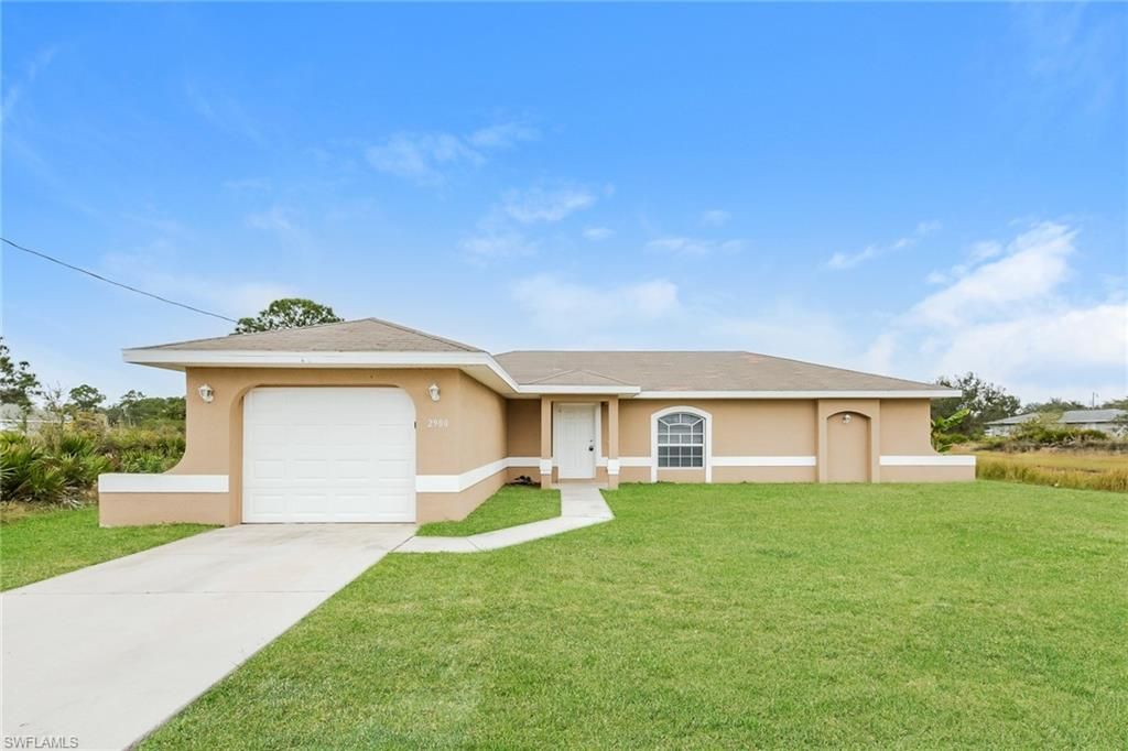 2900 73rd ST W, LEHIGH ACRES, FL 33971 — exterior