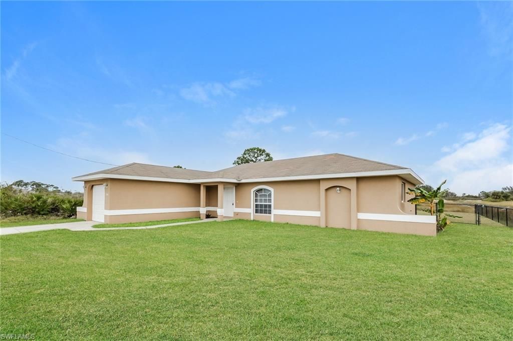 2900 73rd ST W, LEHIGH ACRES, FL 33971 — photo 2