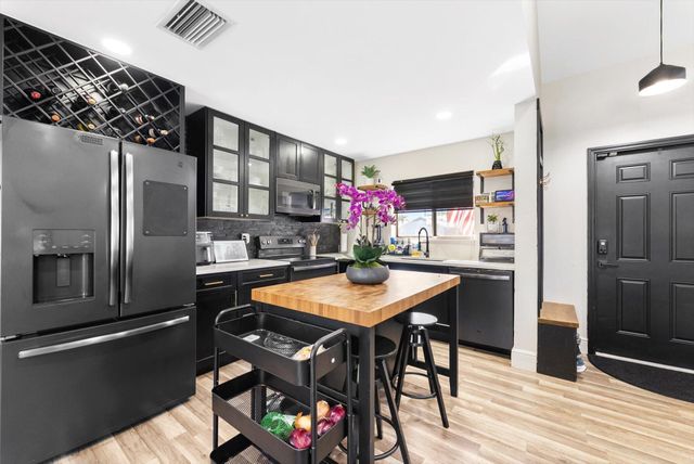 396 Monte Trail, West Palm Beach, FL 33415