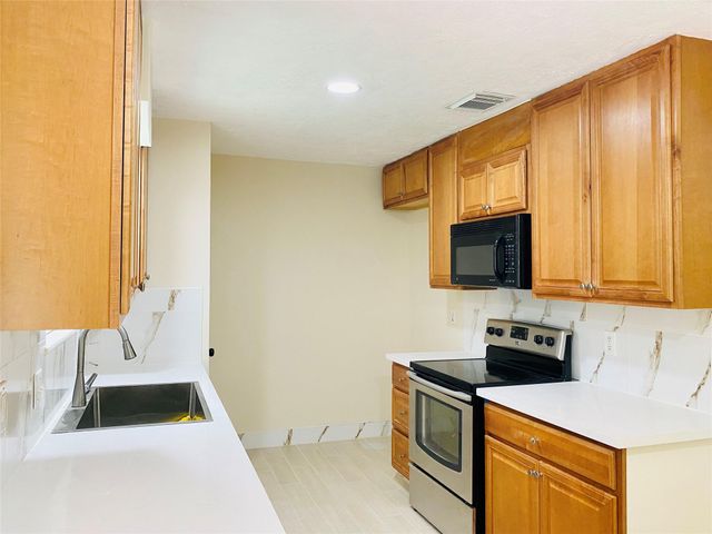 13447 Greenway Drive, Sugar Land, TX 77498