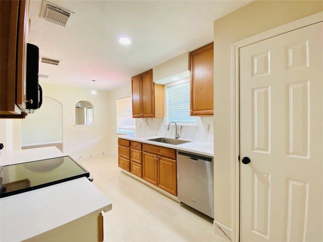 13447 Greenway Drive, Sugar Land, TX 77498