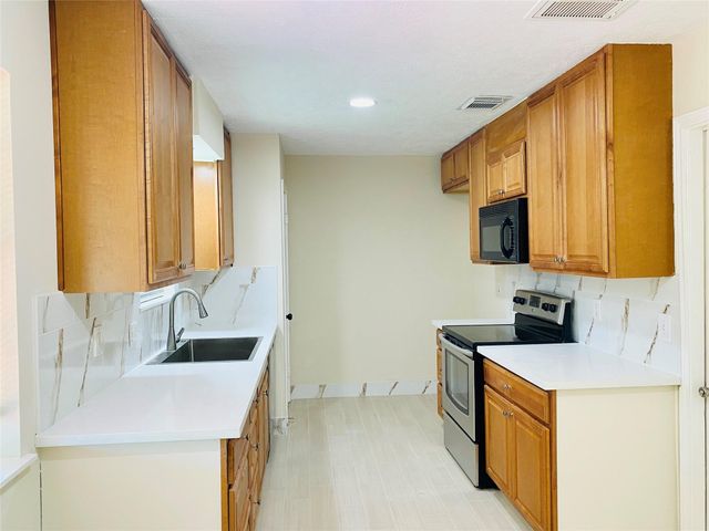 13447 Greenway Drive, Sugar Land, TX 77498