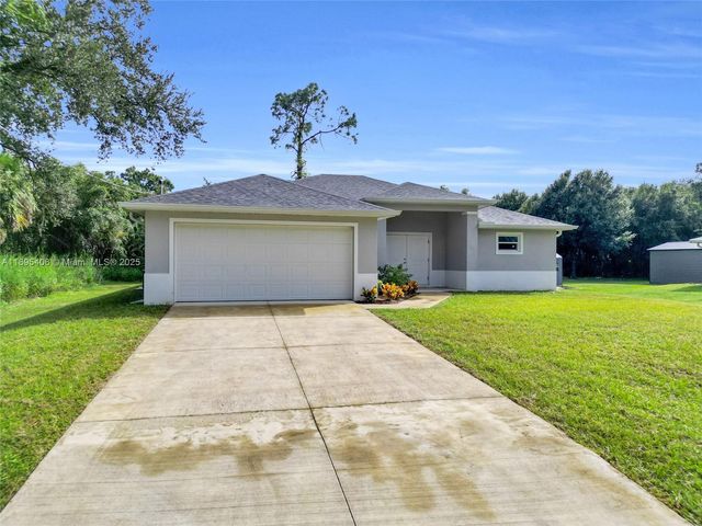 1006 Asther St E, Lehigh Acres, FL 33974