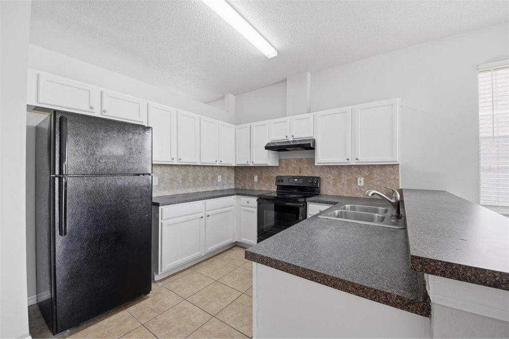 Image 5 of property listing at 949 WHISPERING CYPRESS LANE, Orlando, FL 32824